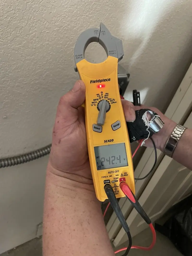 Voltage testing with clamp meter during Generator Installation in San Fernando